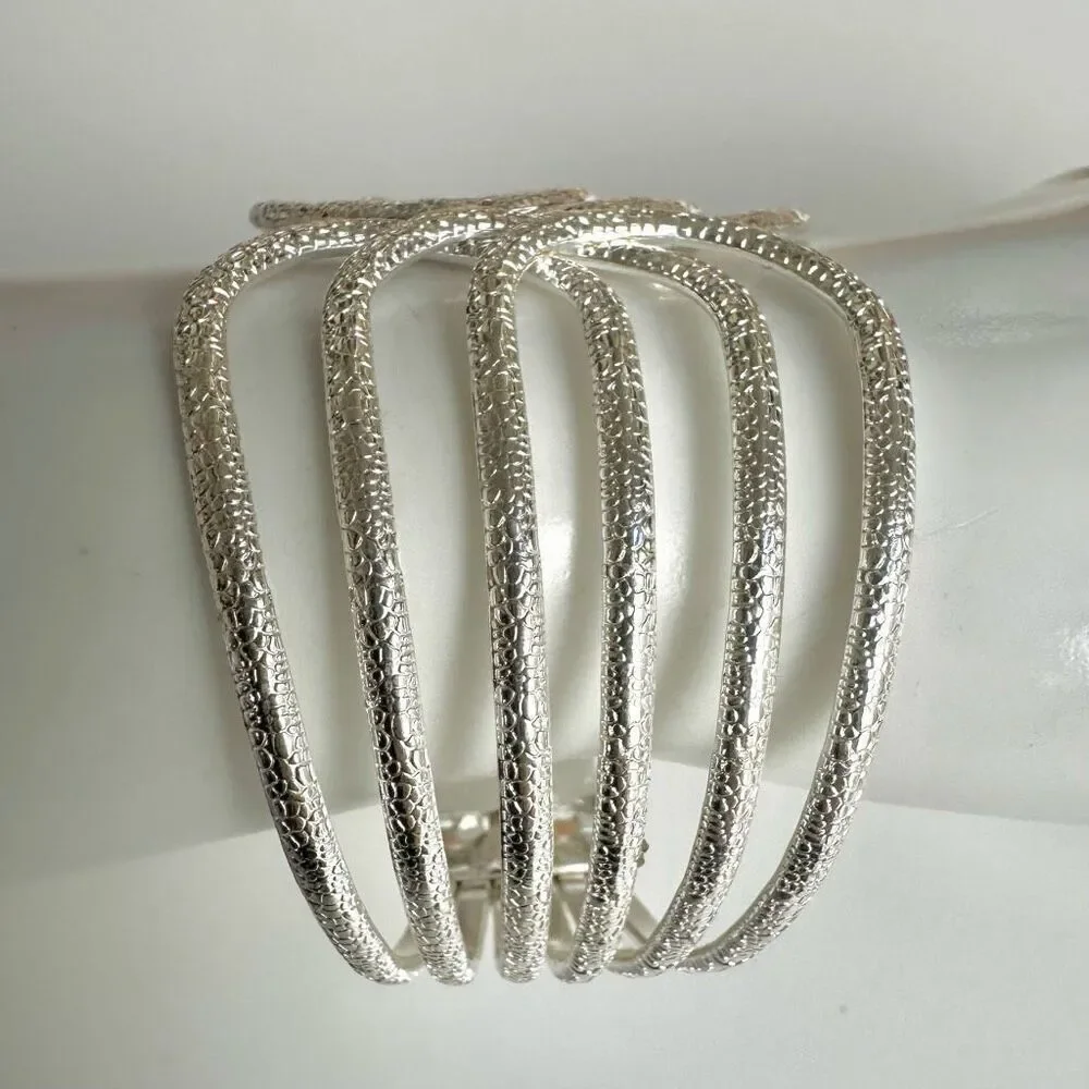 Silver tone textured hinged wide bracelet